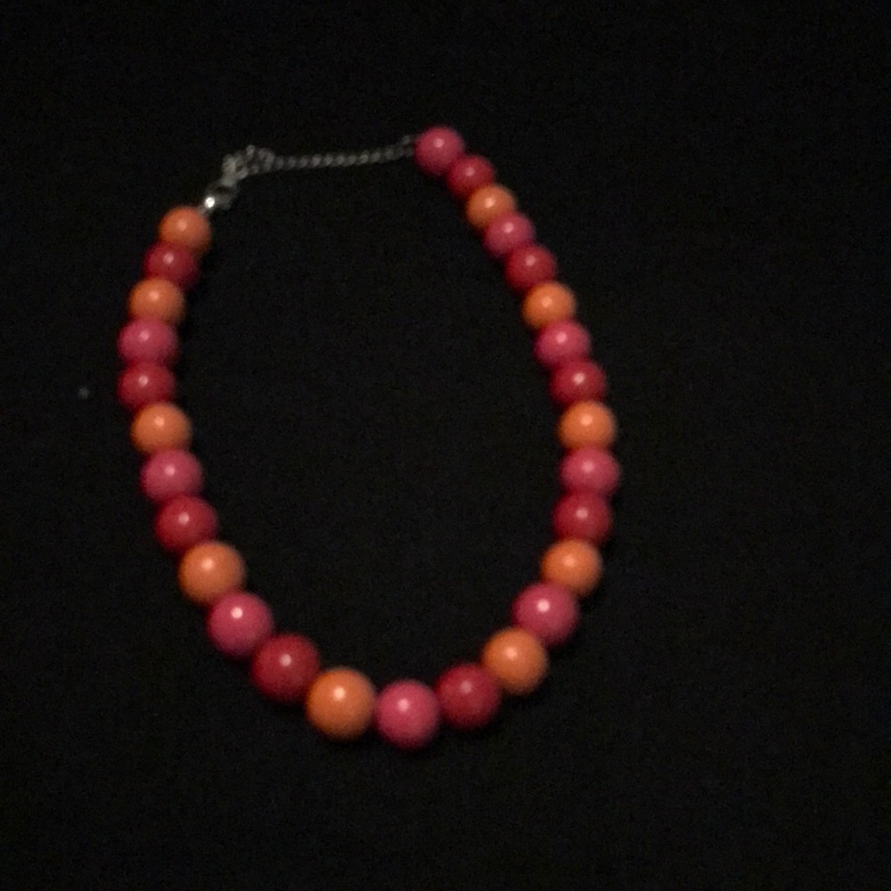 16 inch wooden beads. Orange and color